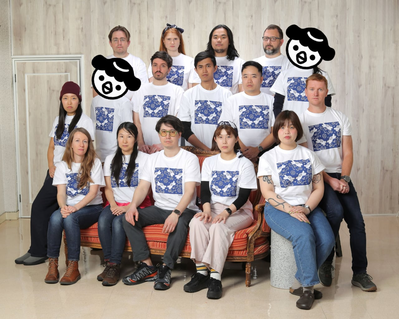 The WaniKani team in matching retreat shirts, posing for a group photo at the Kurashiki studio